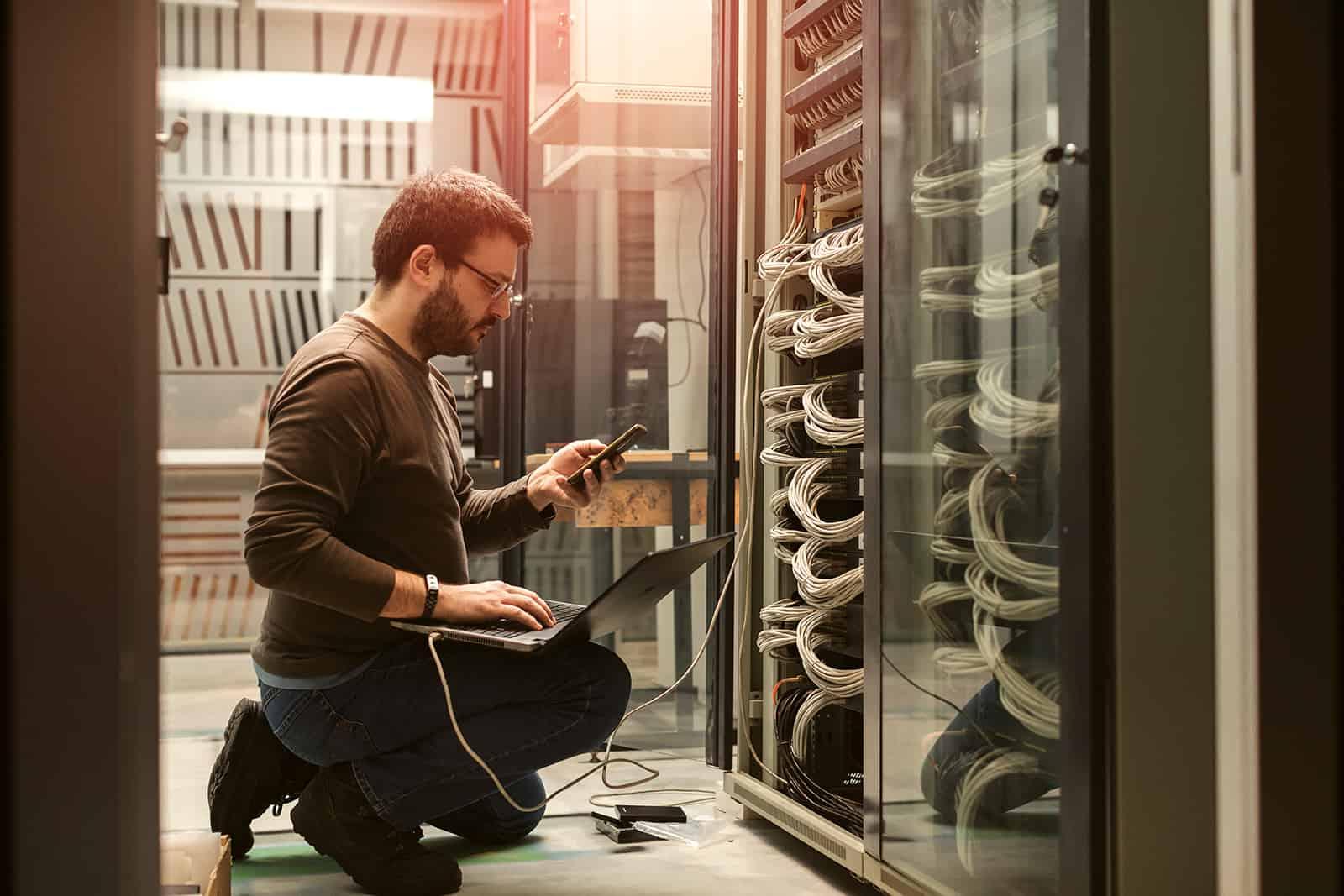 Person working on networking servers